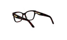 A pair of dark-colored, tortoiseshell-patterned glasses with gold accents, positioned facing towards the right side of the image.