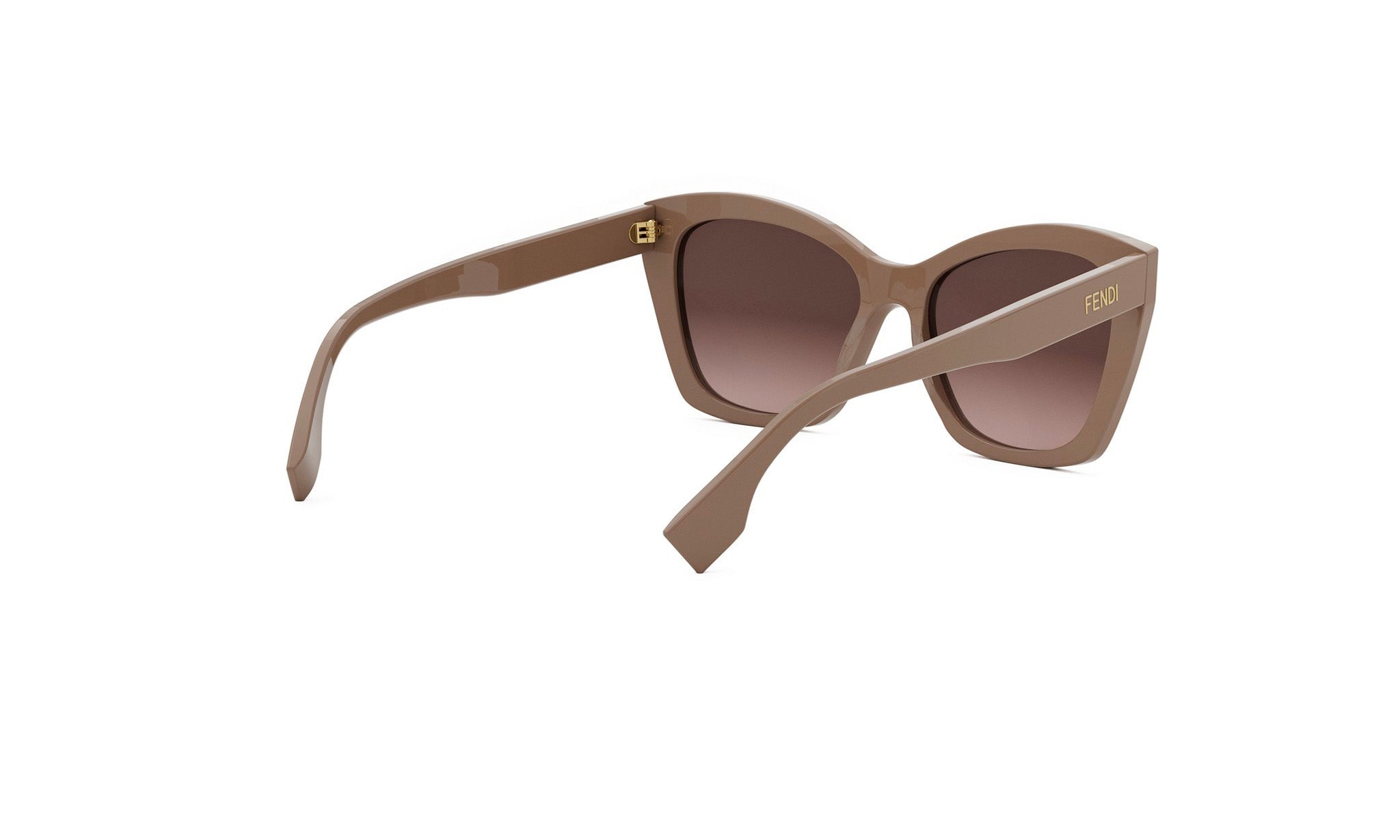A pair of tan-colored sunglasses with a Fendi logo on the frame.