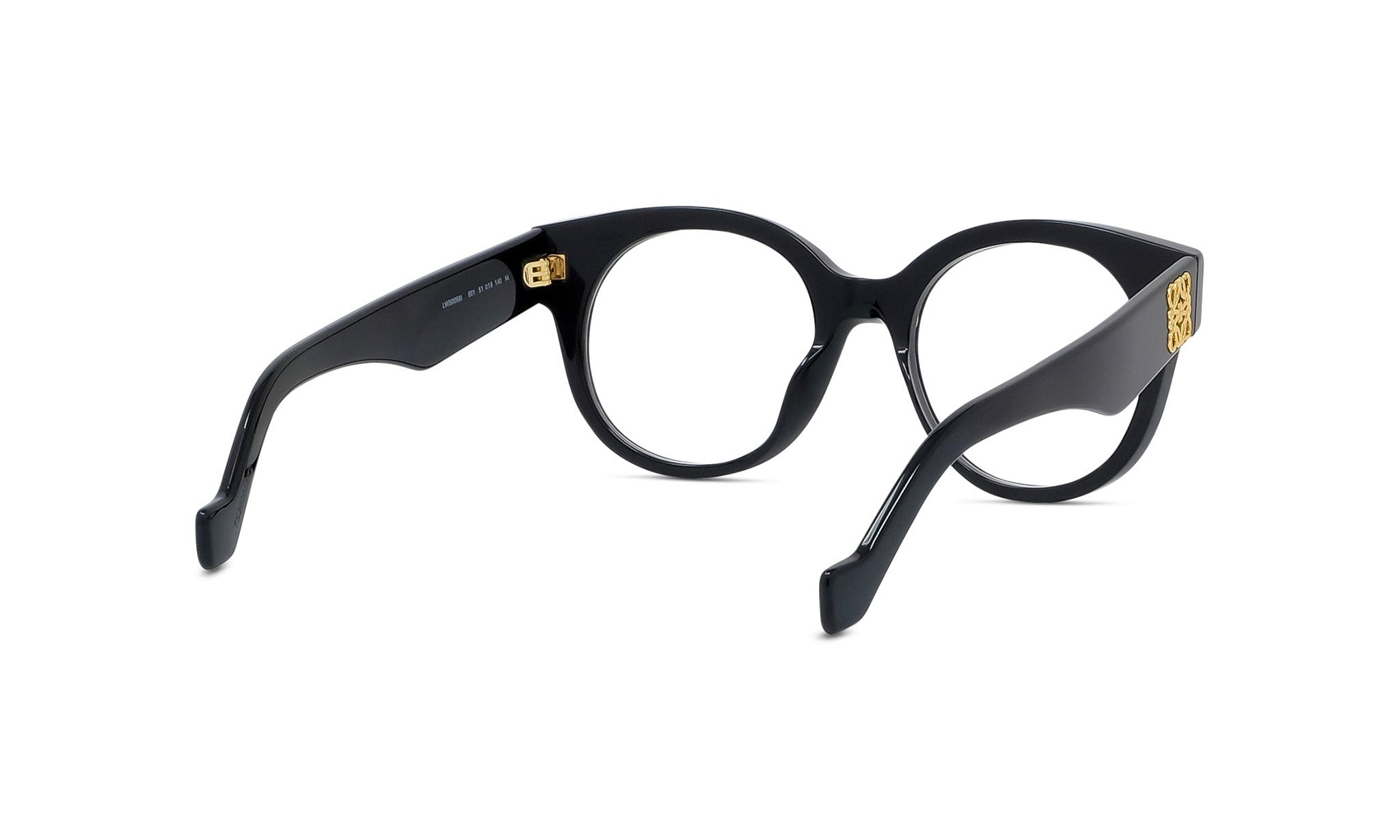 A pair of black-framed glasses with gold accents.