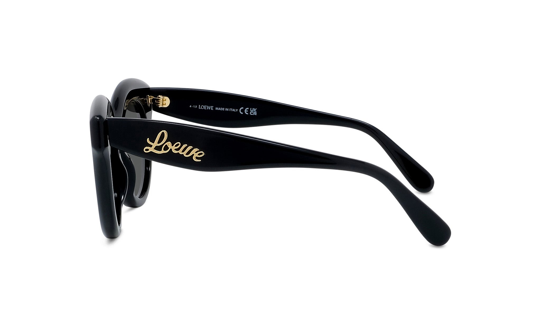 A pair of black sunglasses with gold text on the frame.