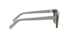 A pair of green sunglasses with the Celine logo visible on the frame.