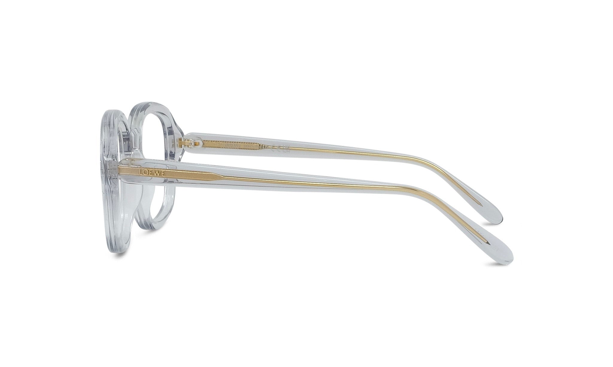 A pair of clear eyeglasses with gold accents, positioned side by side against a white background.