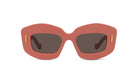A pair of pink-framed sunglasses with dark lenses.