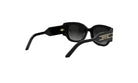 A pair of black sunglasses with gold accents, featuring a distinctive design.