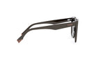 A pair of dark-colored sunglasses with the Fendi logo visible on the frame.