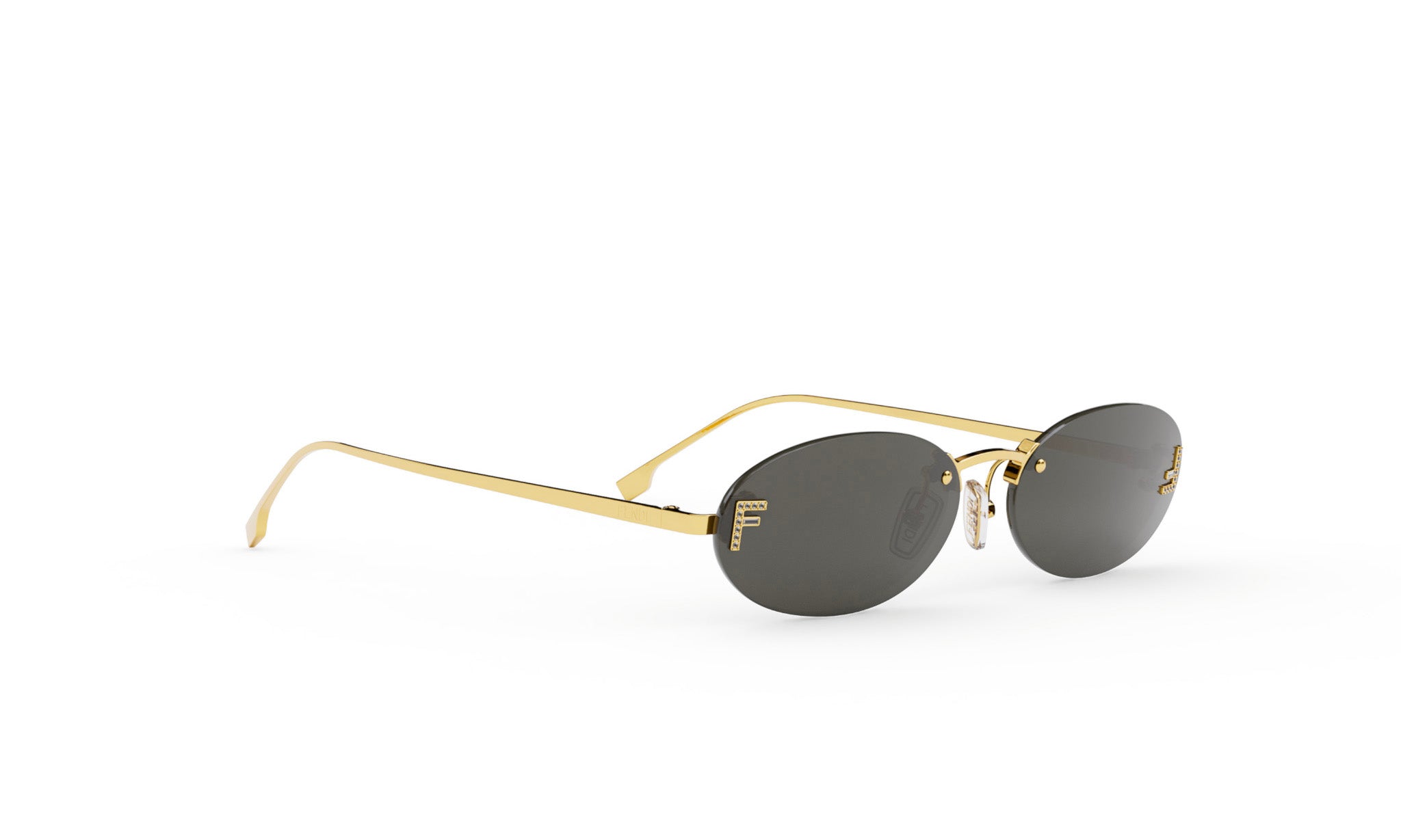 A pair of gold rimmed sunglasses with dark lenses.