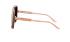 A pair of sunglasses with a brown frame and pink temples.