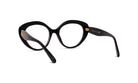 A pair of black cat-eye framed glasses with gold accents.