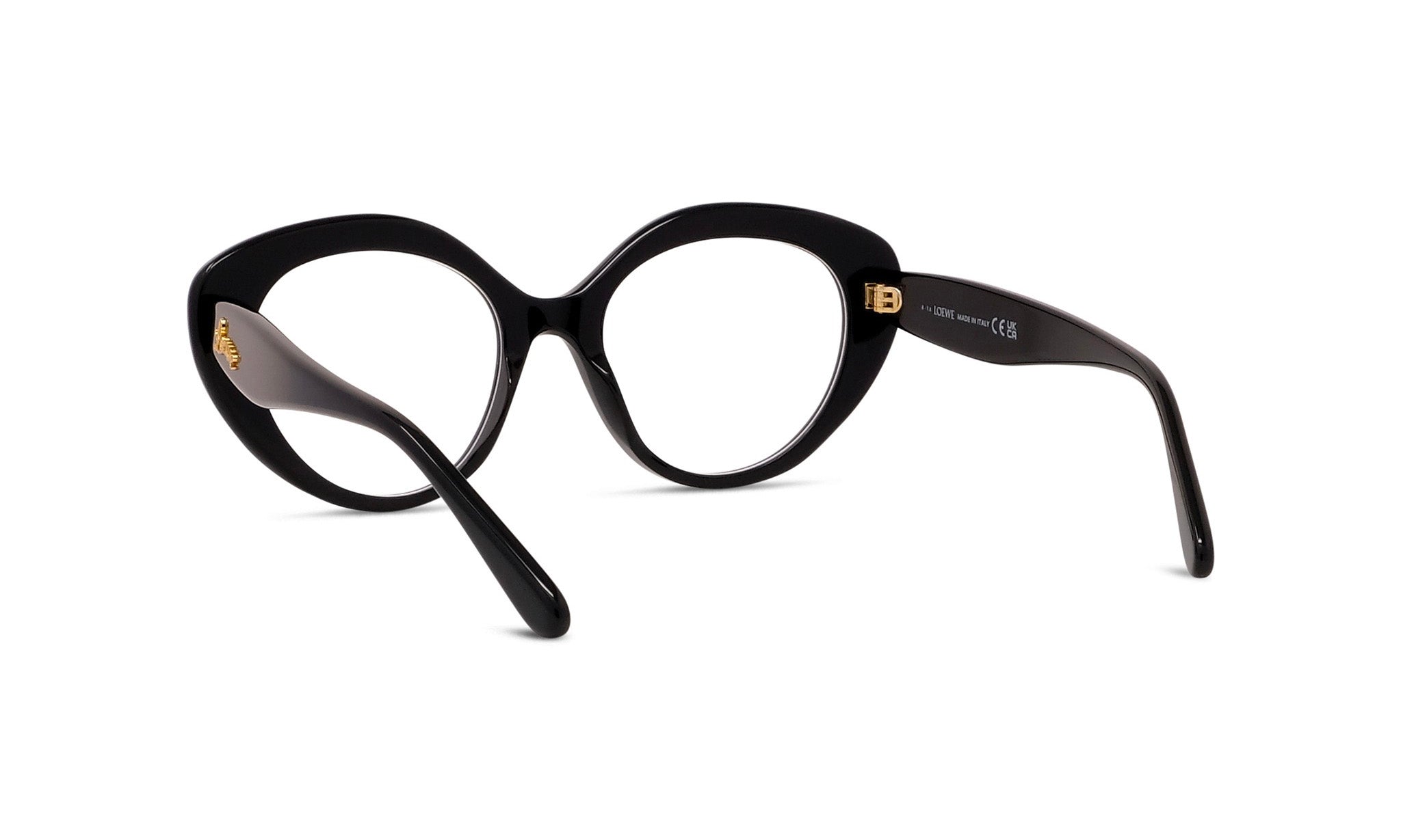A pair of black cat-eye framed glasses with gold accents.