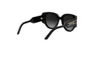 A pair of black sunglasses with a gold logo on the frame.