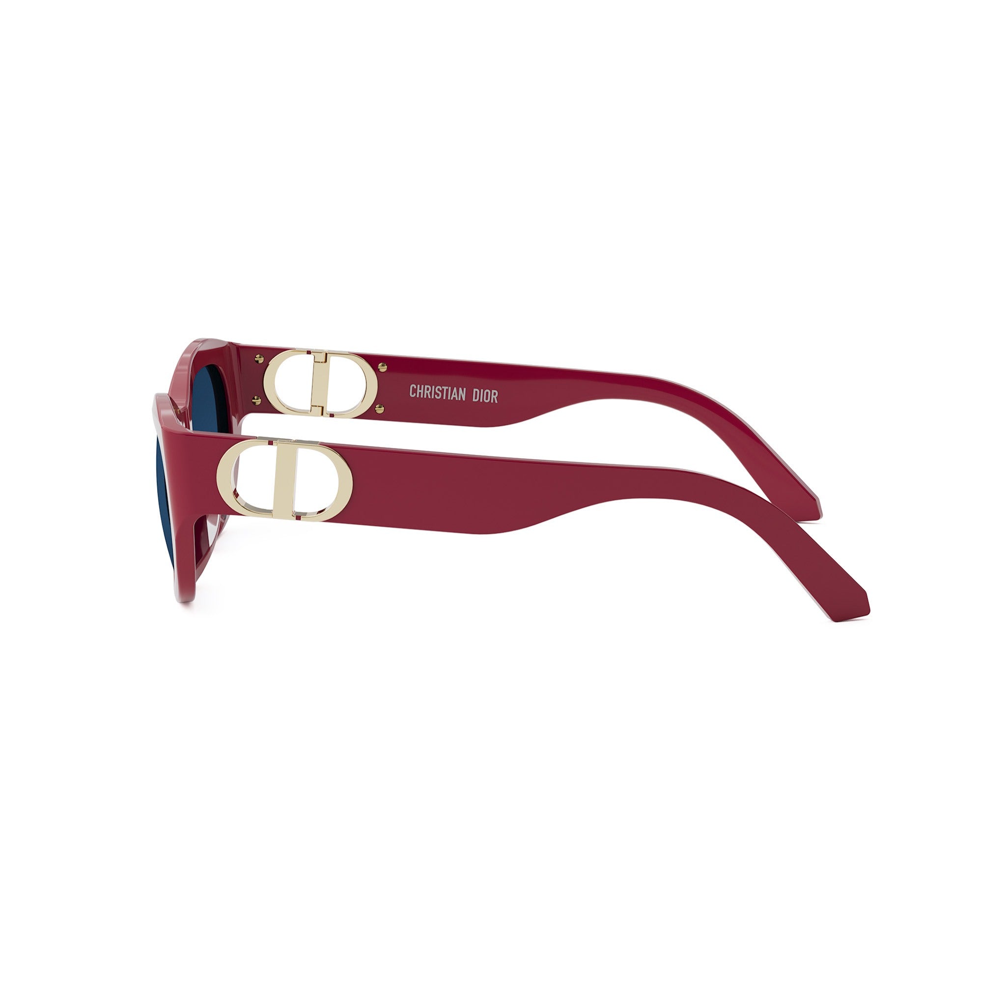 A pair of red sunglasses with gold DOR logos on the temples.