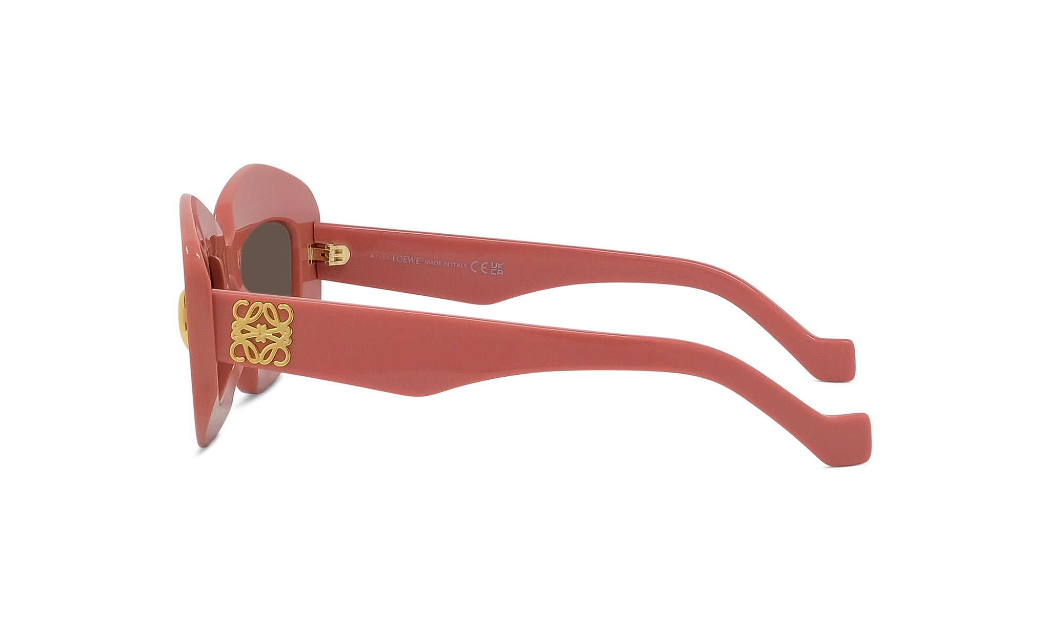 A pair of pink sunglasses with gold accents, featuring a logo on the frame.