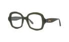 A pair of dark green, oversized glasses with a gold logo on the frame.