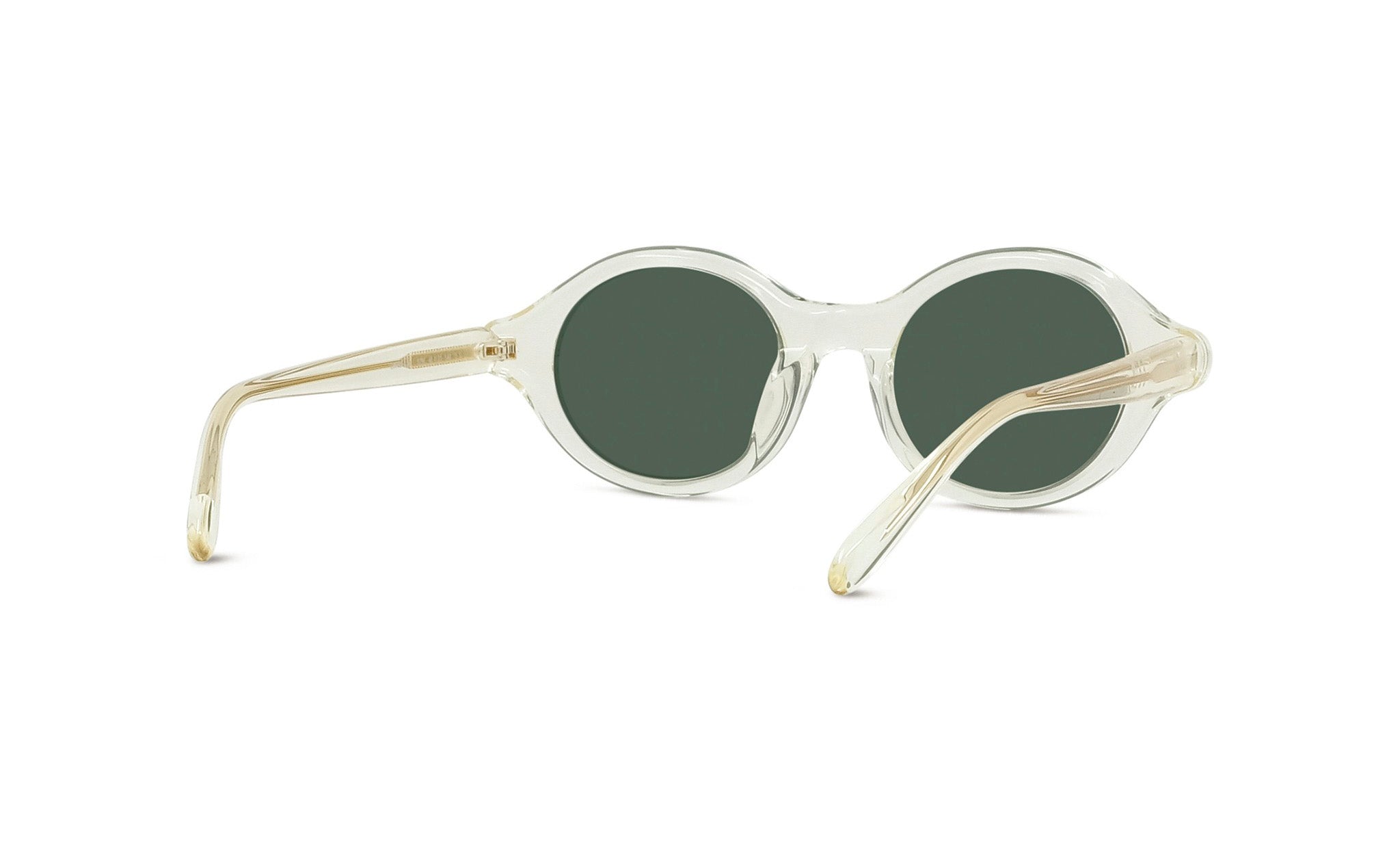 A pair of round, clear sunglasses with green lenses.